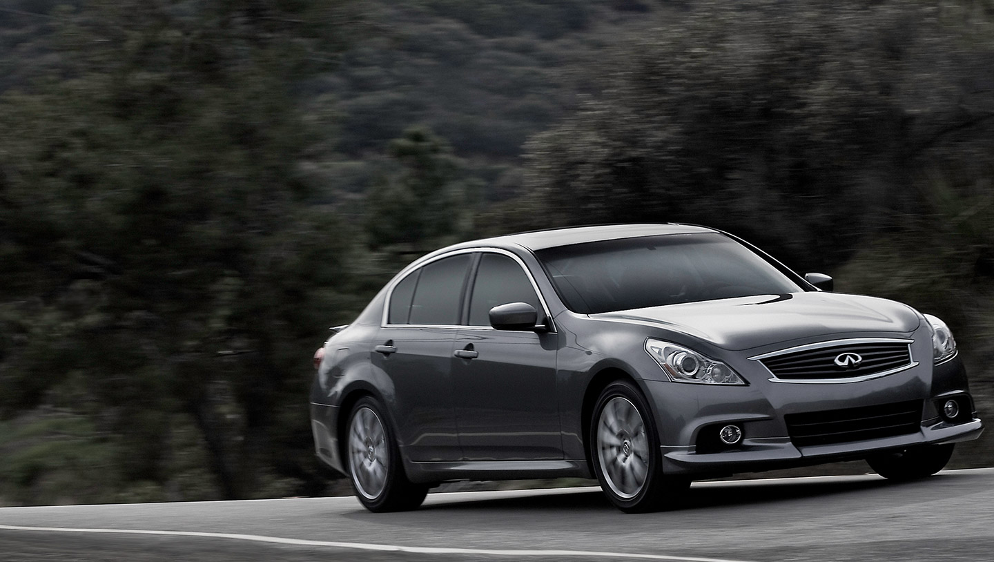 Angled view of a INFINITI G37 luxury coupe driving