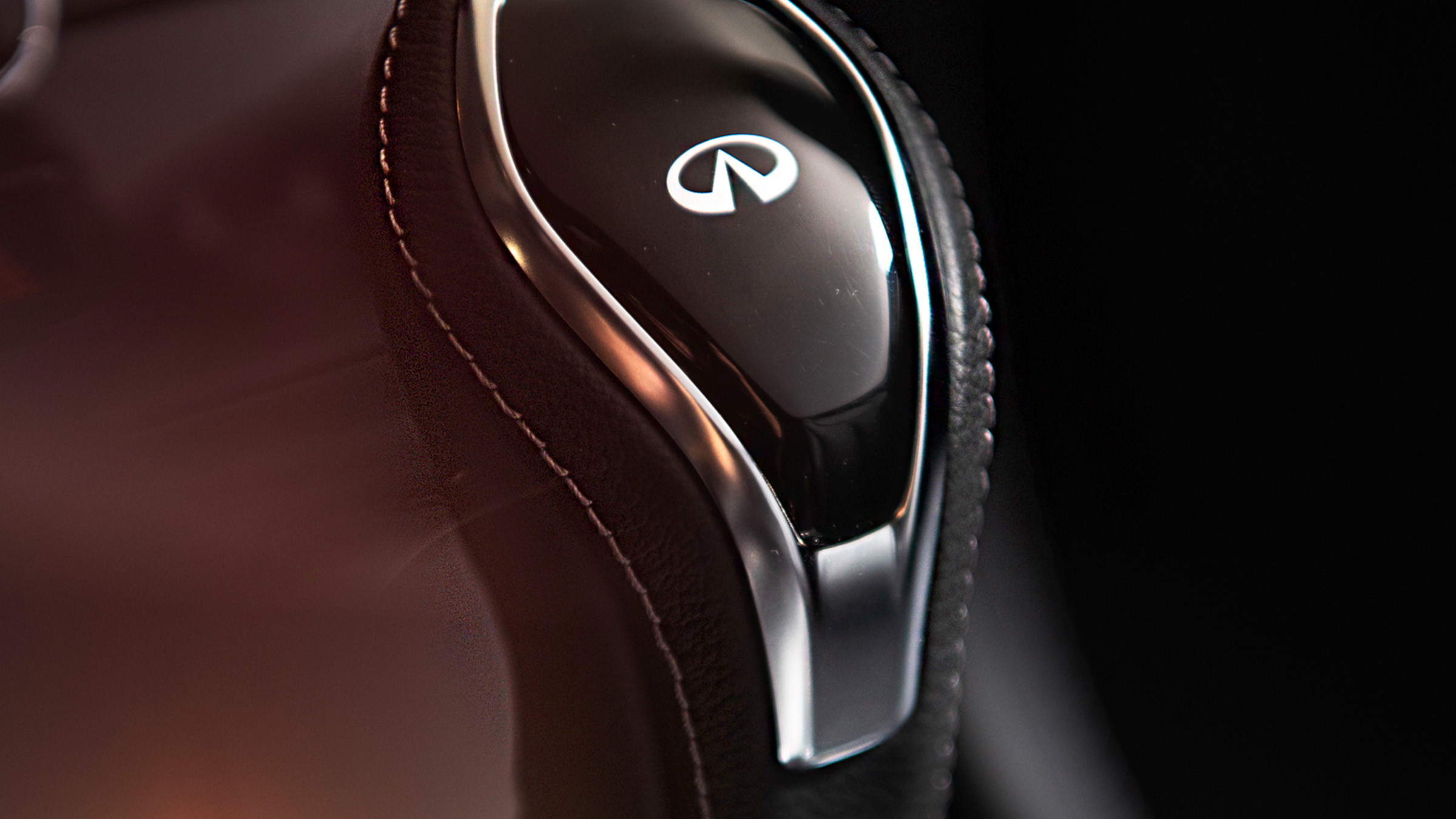 2022 INFINITI Q60 coupe leather covered gear stick.
