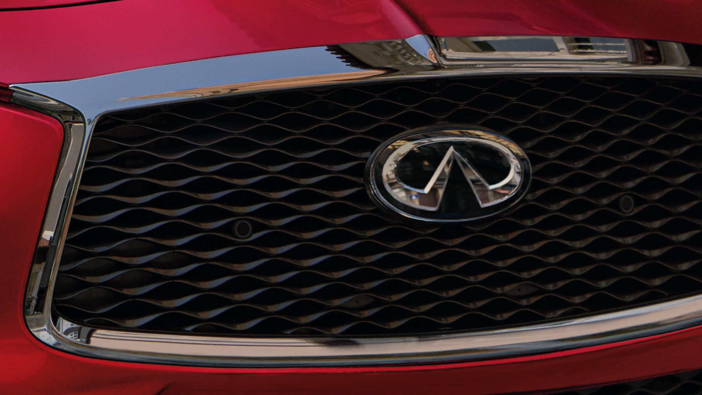 2022 INFINITI Q60 red coupe double arch grille.