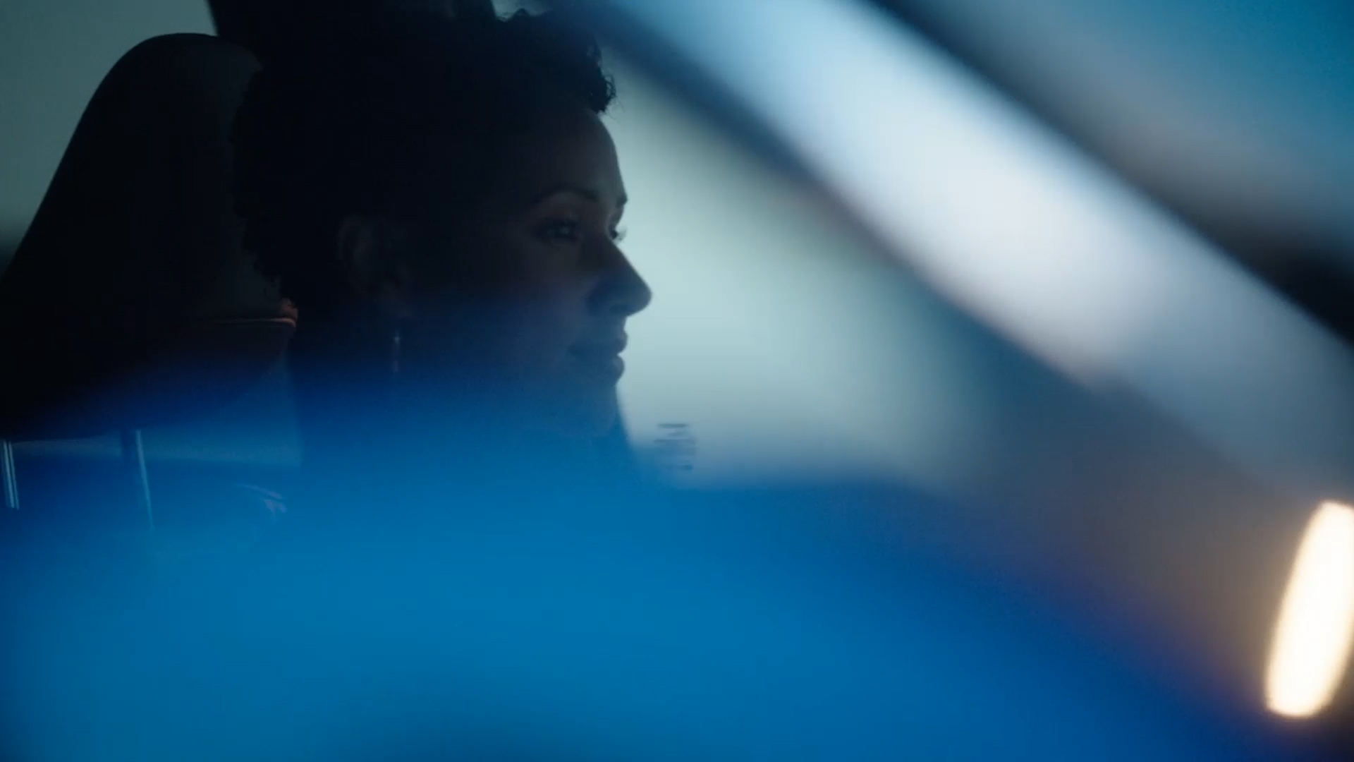 Woman driving inside the 2023 INFINITI QX60 Crossover SUV