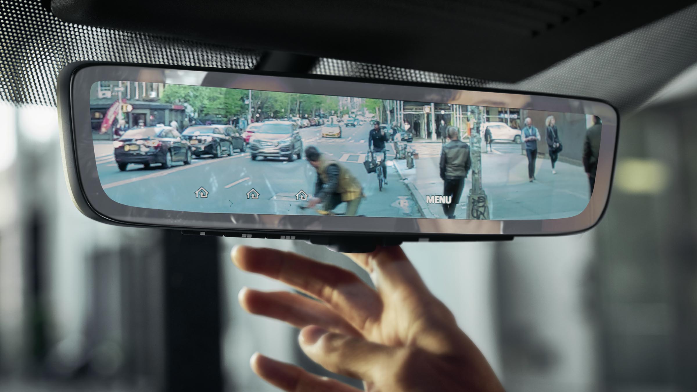 Close-up of 2022 INFINITI QX80 rearview mirror.